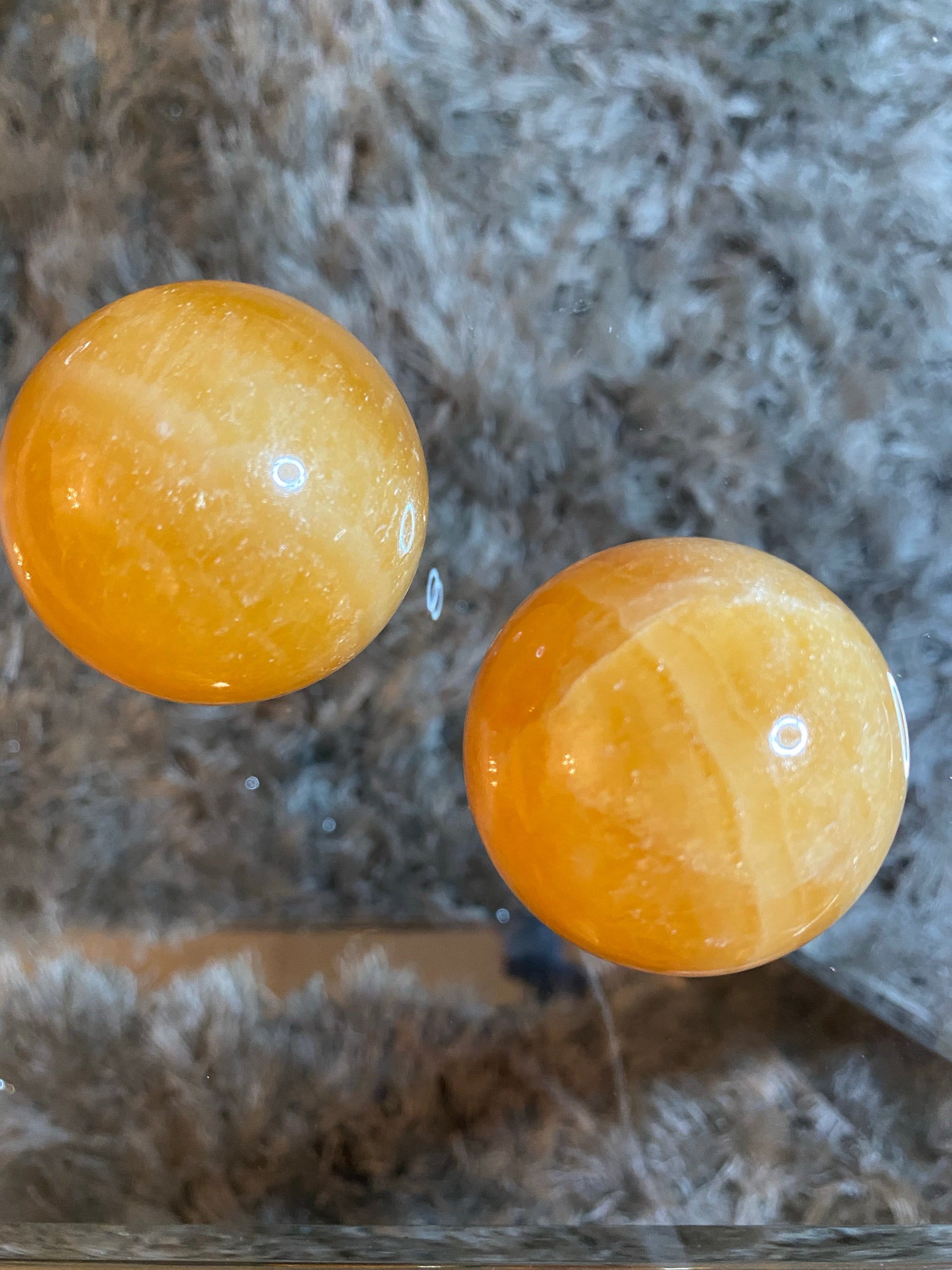 Orange Calcite Spheres Indigo Fluorite Tower metaphysics crystal gemstone crystal shop canadian local meditation manifestation spiritual healing holistic journey sage smudging palo santo toronto chakras alignment reiki