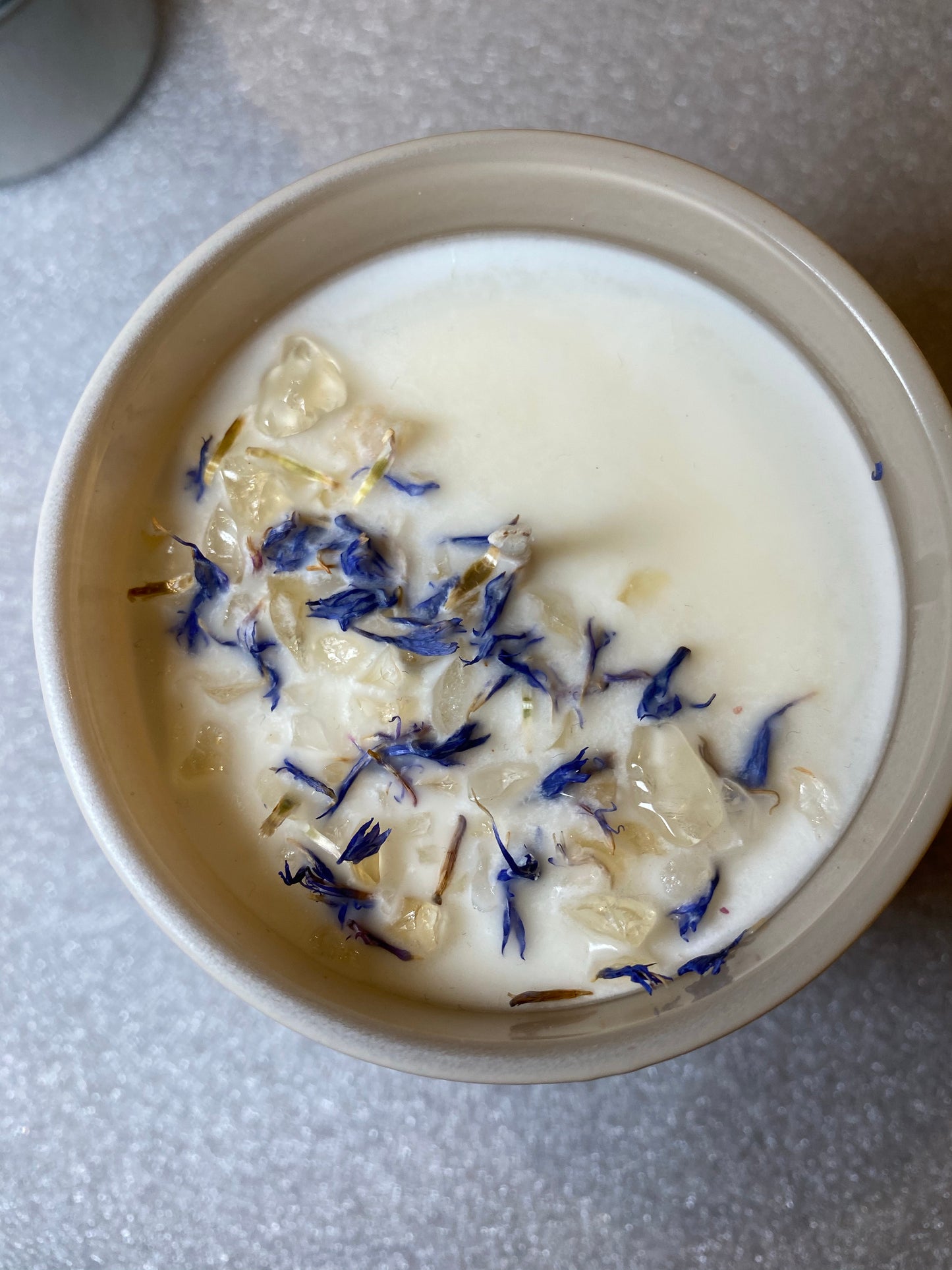 100% soy candle with a fig + poppy + ambertte scent topped with citrine 